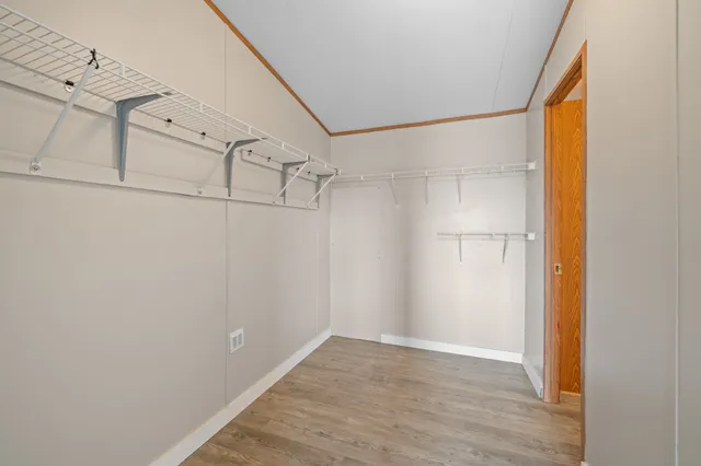 a view of a room with racks on the wall