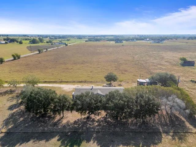 a view of a lake from a yard