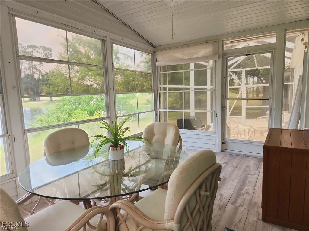 10401 Circle Pine Road North Fort Myers, FL 33903 - Photo 20 of 20 a view of a dining room with furniture window and outside view