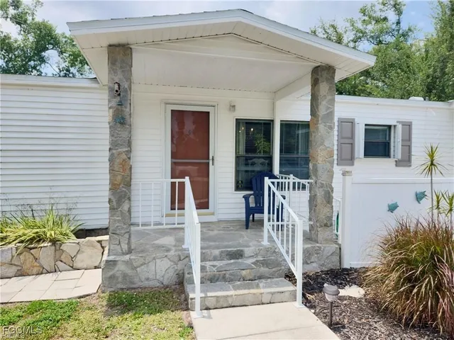 a front view of a house with a porch