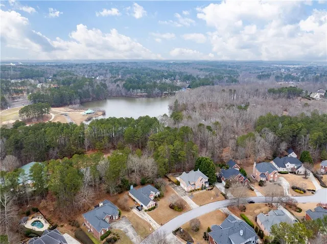 a view of a kitchen with a sink and a yard