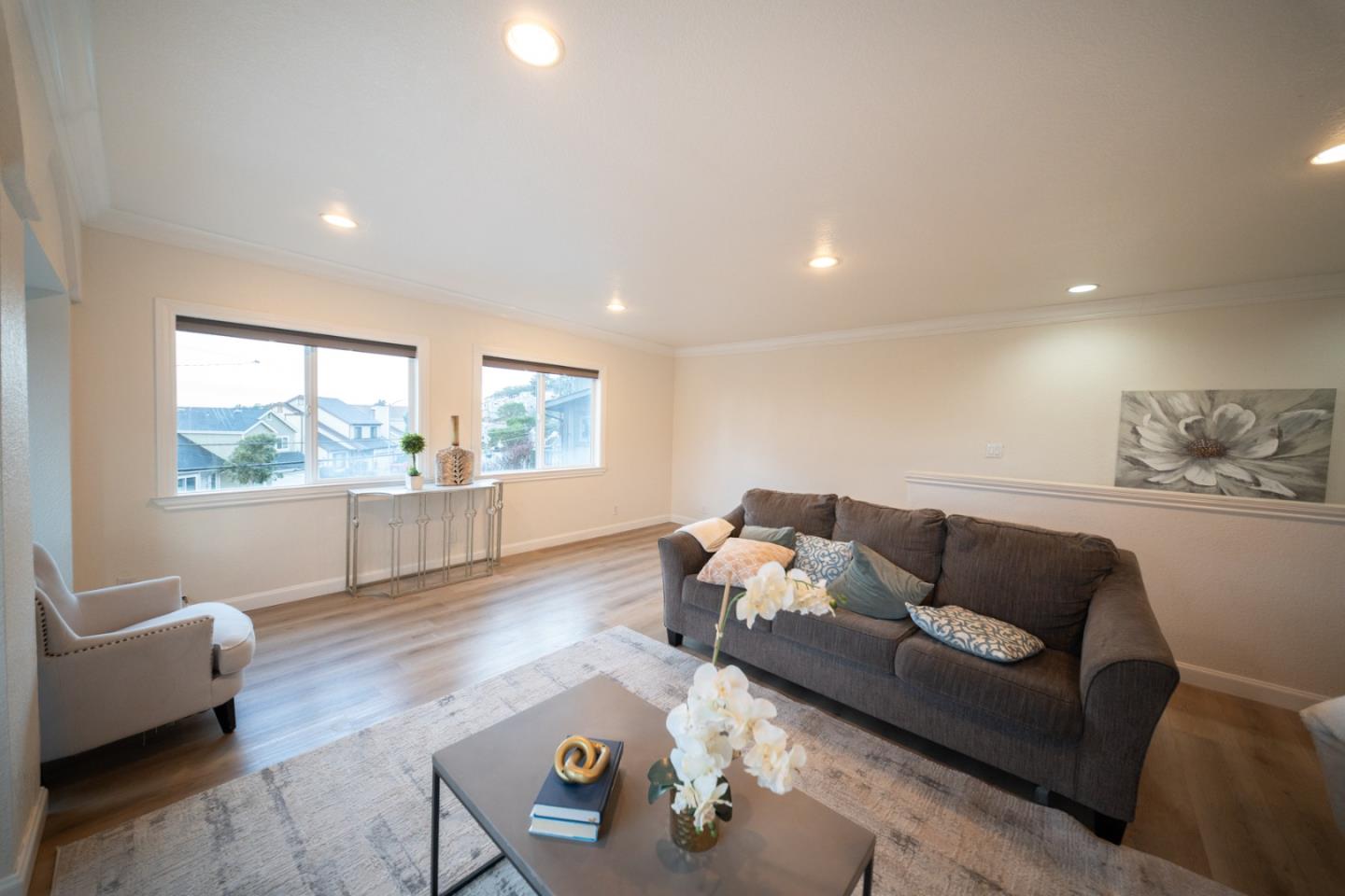 301 Channing Way Pacifica, CA 94044 - Photo 12 of 68 a living room with furniture and a large window