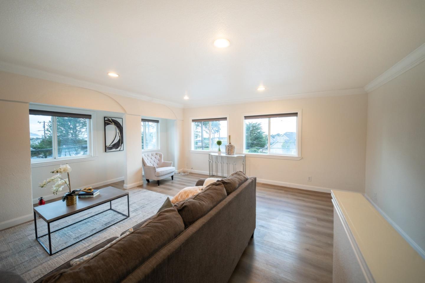 301 Channing Way Pacifica, CA 94044 - Photo 15 of 68 a living room with furniture window and wooden floor