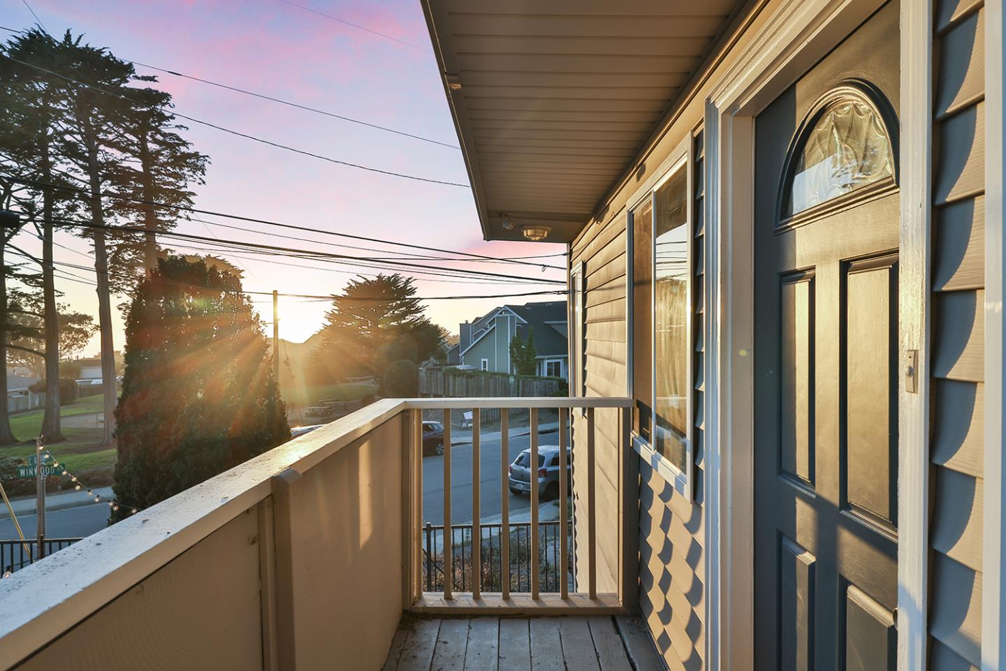 301 Channing Way Pacifica, CA 94044 - Photo 16 of 68 a view of a balcony with wooden floor