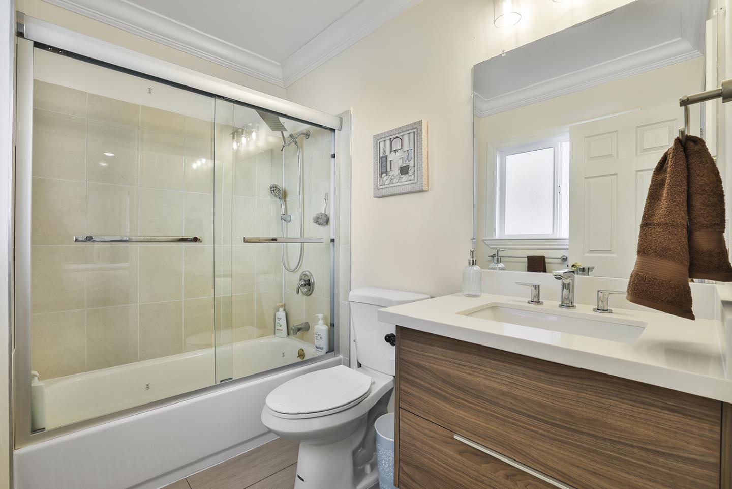 301 Channing Way Pacifica, CA 94044 - Photo 18 of 68 a bathroom with a sink a toilet and shower