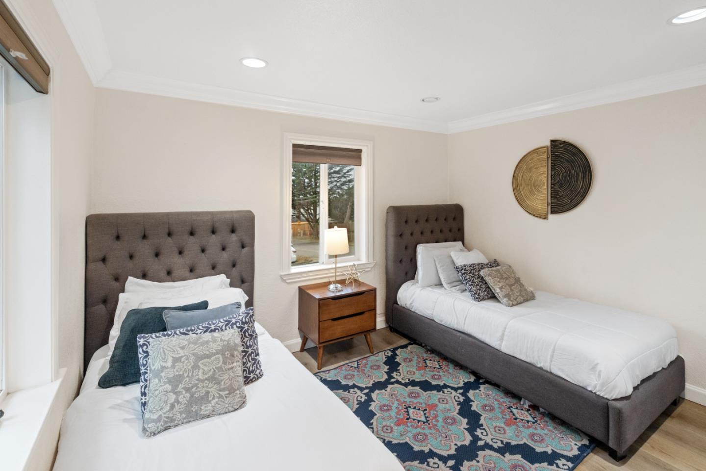 301 Channing Way Pacifica, CA 94044 - Photo 29 of 68 a bedroom with a bed and window with couch