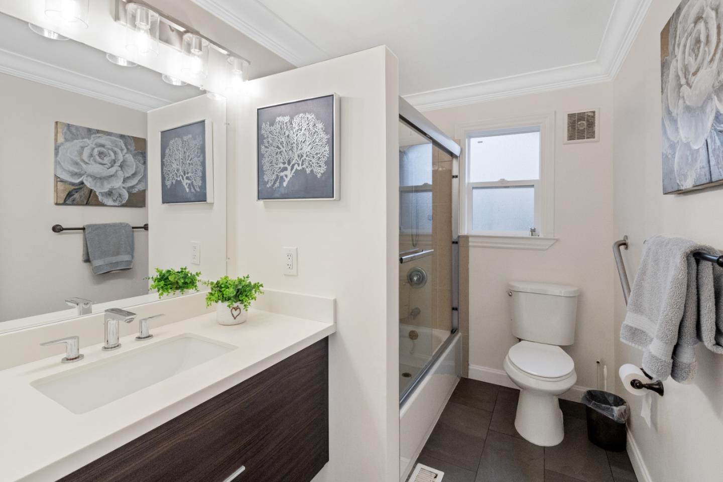 301 Channing Way Pacifica, CA 94044 - Photo 31 of 68 a bathroom with a toilet sink and mirror