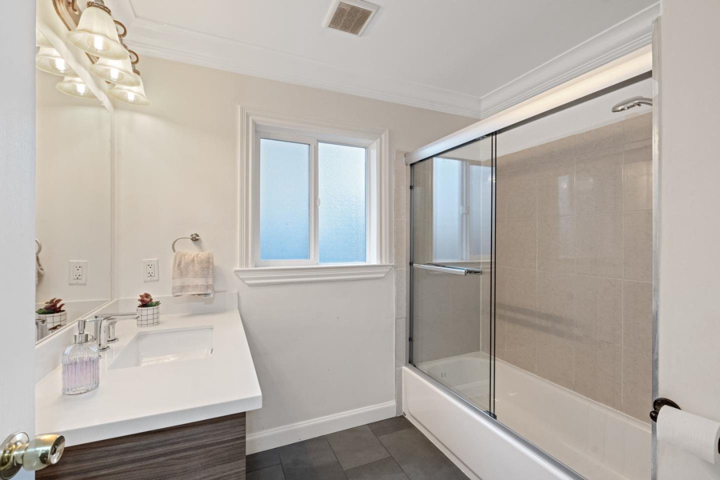 301 Channing Way Pacifica, CA 94044 - Photo 36 of 68 a bathroom with a bathtub and a sink