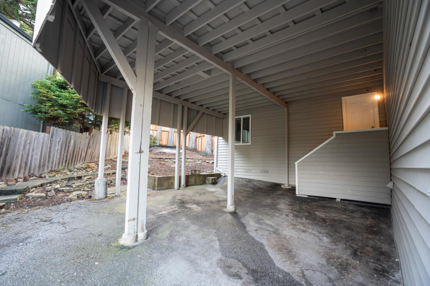 301 Channing Way Pacifica, CA 94044 - Photo 54 of 68 a view of an empty room with wooden walls
