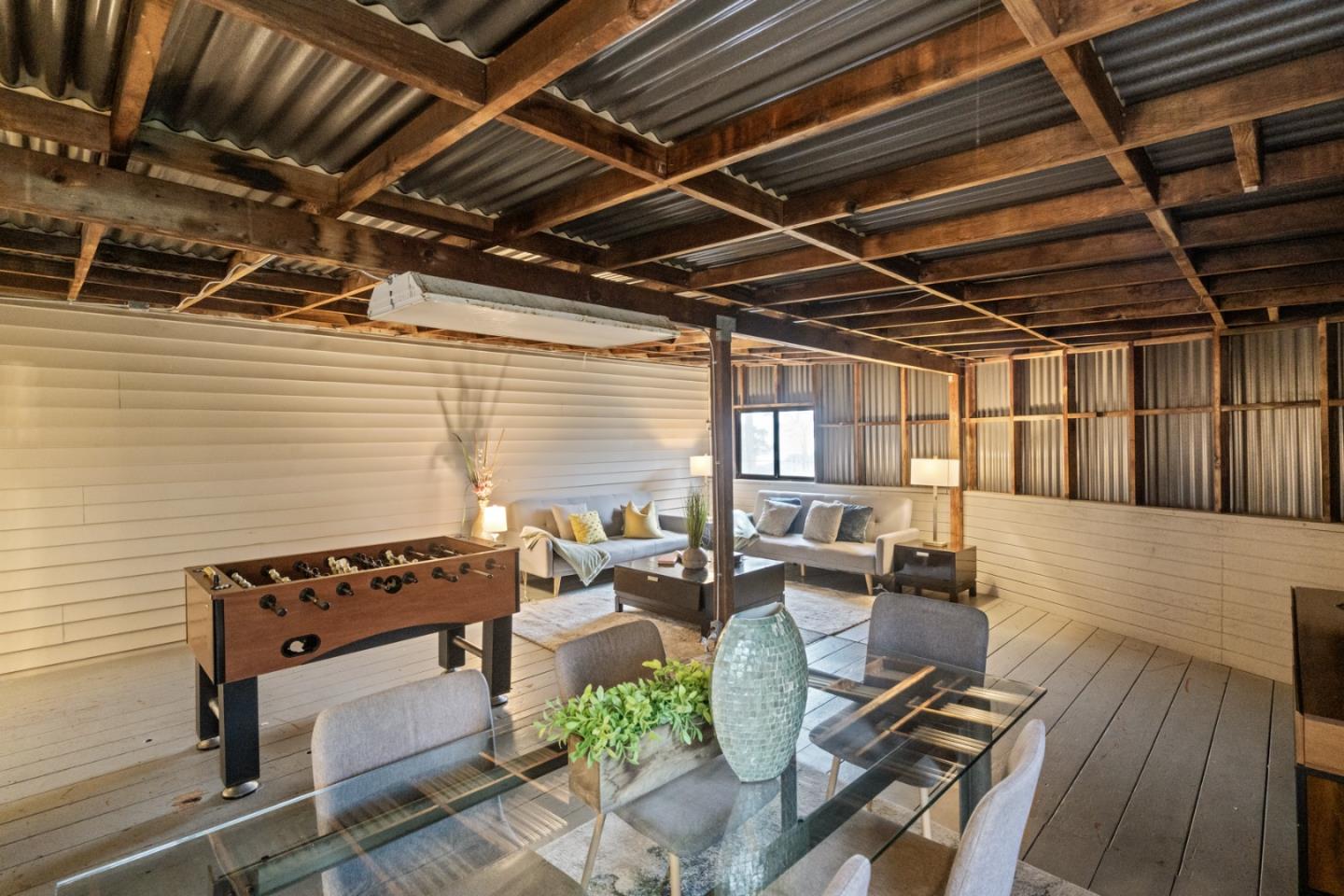 301 Channing Way Pacifica, CA 94044 - Photo 63 of 68 a view of a patio with chairs and a barbeque