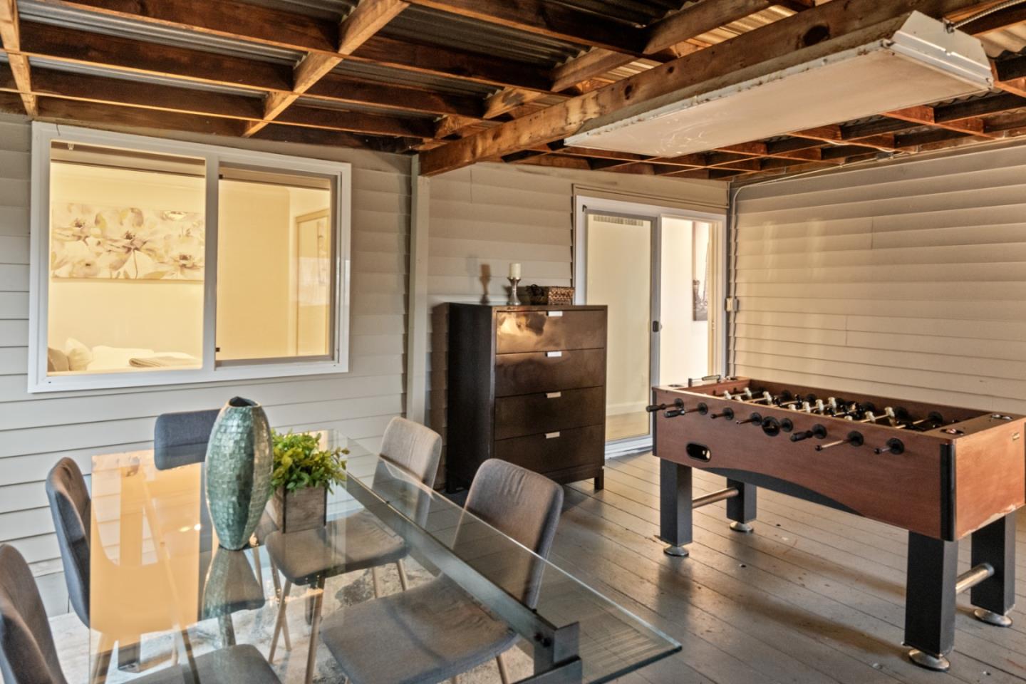 301 Channing Way Pacifica, CA 94044 - Photo 64 of 68 a living room with furniture and wooden floor
