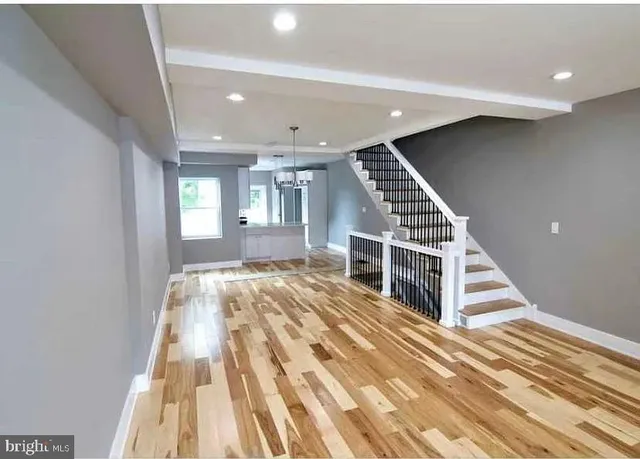 a view of a living room with windows