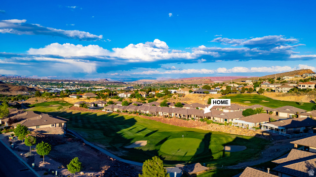 2212 Chippenham Court St. George, UT 84770 - Photo 74 of 75 Aerial perspective of suburban area featuring a golf club and a mountain backdrop