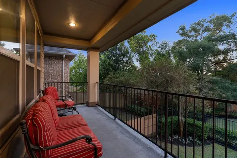 a balcony with furniture