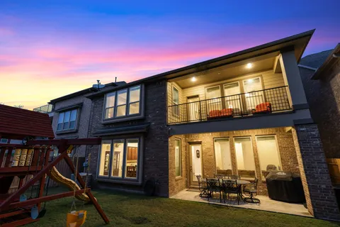 a view of a house with a swimming pool