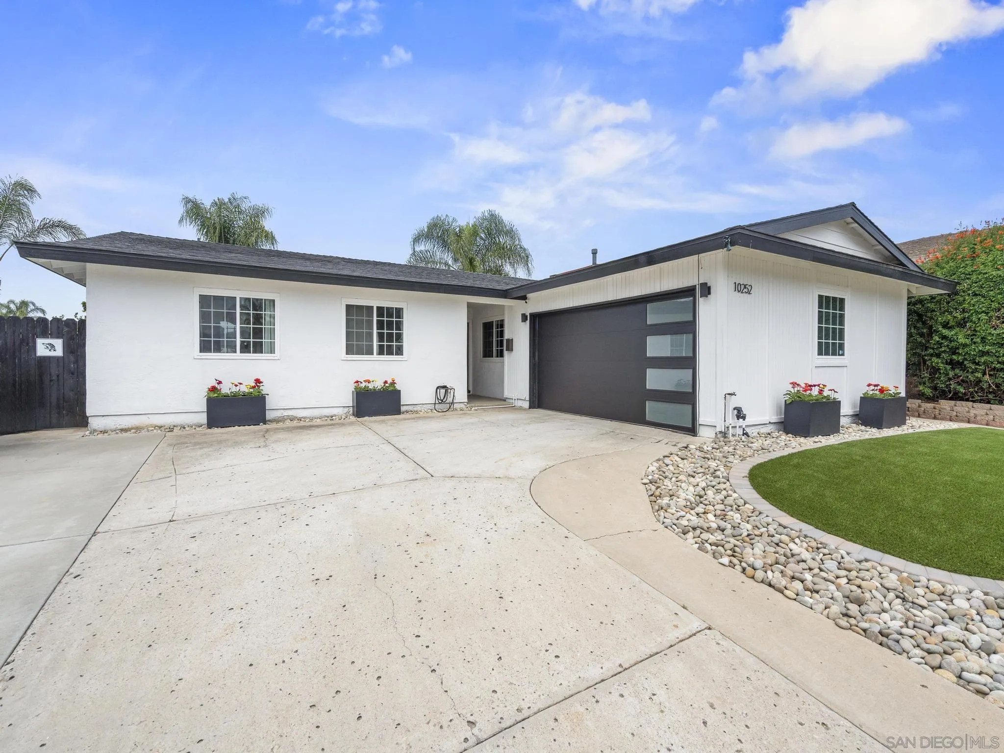 10252 Santana Street Santee, CA 92071 - Photo 1 of 21 a view of a house with a yard
