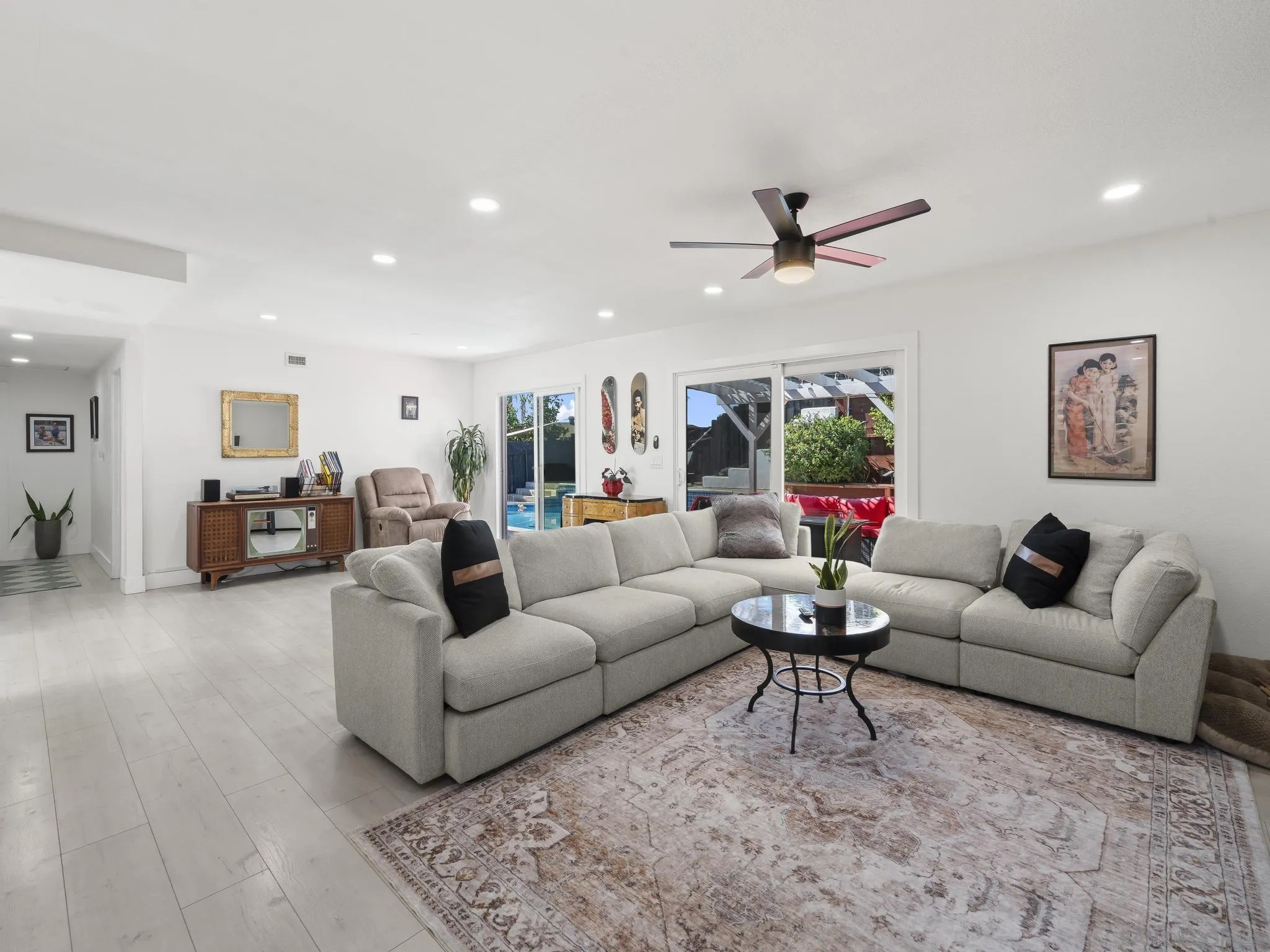 10252 Santana Street Santee, CA 92071 - Photo 5 of 21 a living room with furniture or view and a chandelier