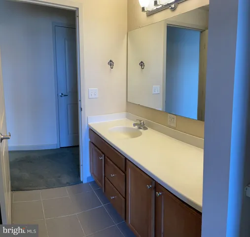 an aerial view of a house with a lake view