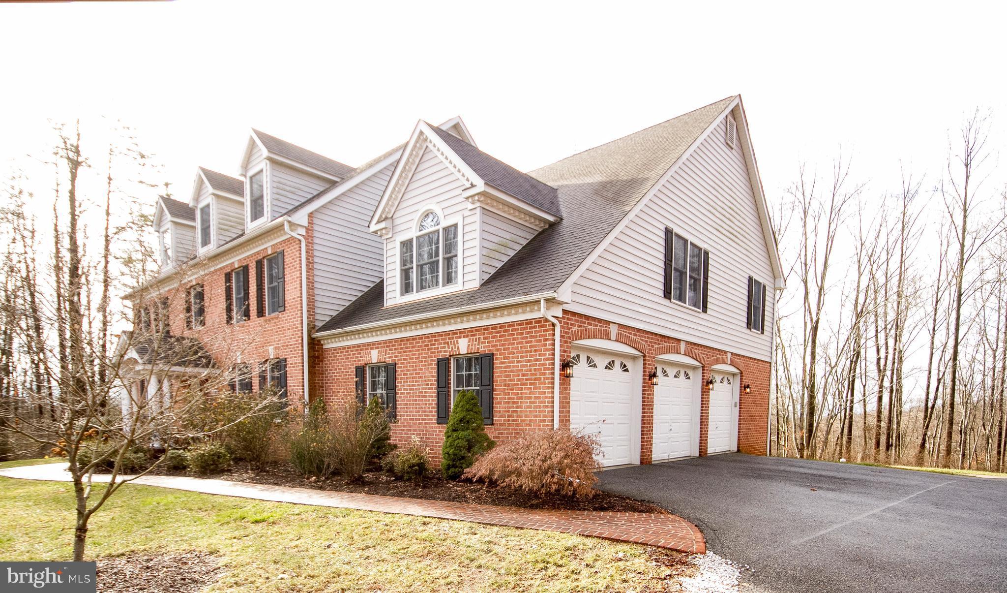 3028 Shepperd Road Monkton, MD 21111 - Photo 1 of 23 a front view of a house with a yard