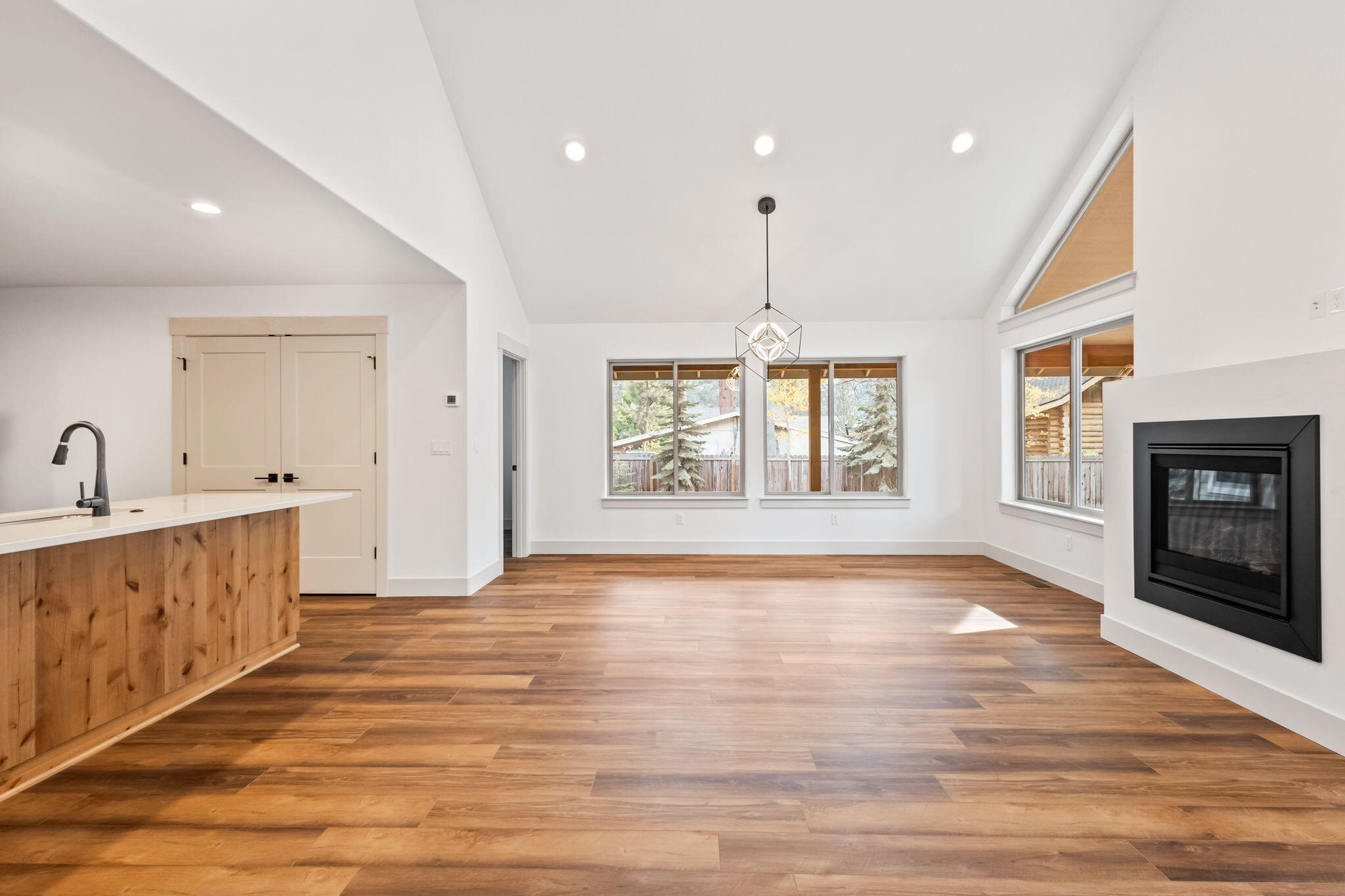 19018 Baker Road, Unit LOT 51 Bend, OR 97702 - Photo 5 of 26 Open and airy great room with gas fireplace