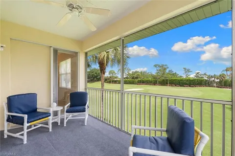 a view of roof deck with furniture