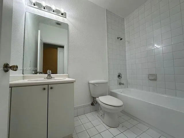 a close up of a bathtub in a bathroom