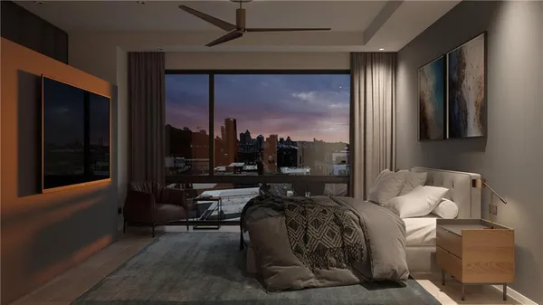 a room with furniture and a large window