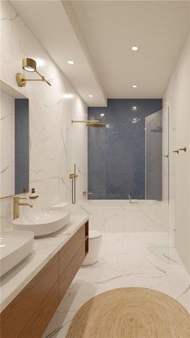 a spacious bathroom with a bathtub sink and mirror