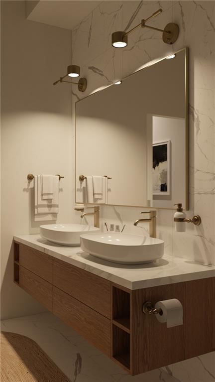 311 27th Street Pittsburgh, PA 15222 - Photo 18 of 22 a bathroom with a sink and a mirror