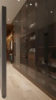 a view of a room with dining table and chairs