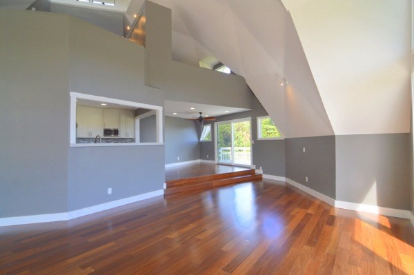 4624 Kuli Road Kalaheo, HI 96741 - Photo 5 of 25 wooden floor in an empty room with a window