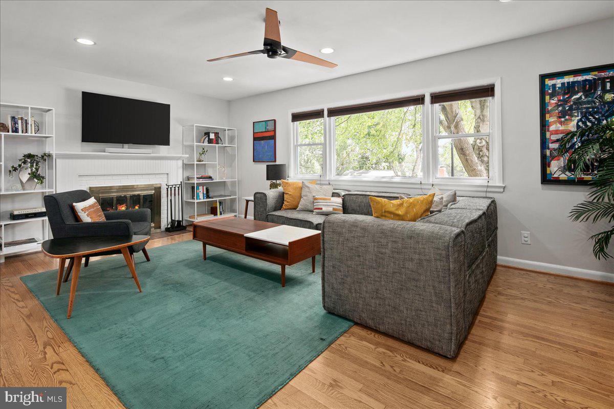5913 4th Road North Arlington, VA 22203 - Photo 5 of 45 a living room with fireplace furniture and a flat screen tv