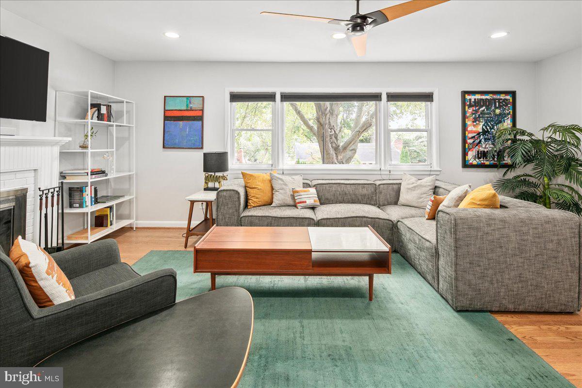 5913 4th Road North Arlington, VA 22203 - Photo 6 of 45 a living room with furniture and a flat screen tv