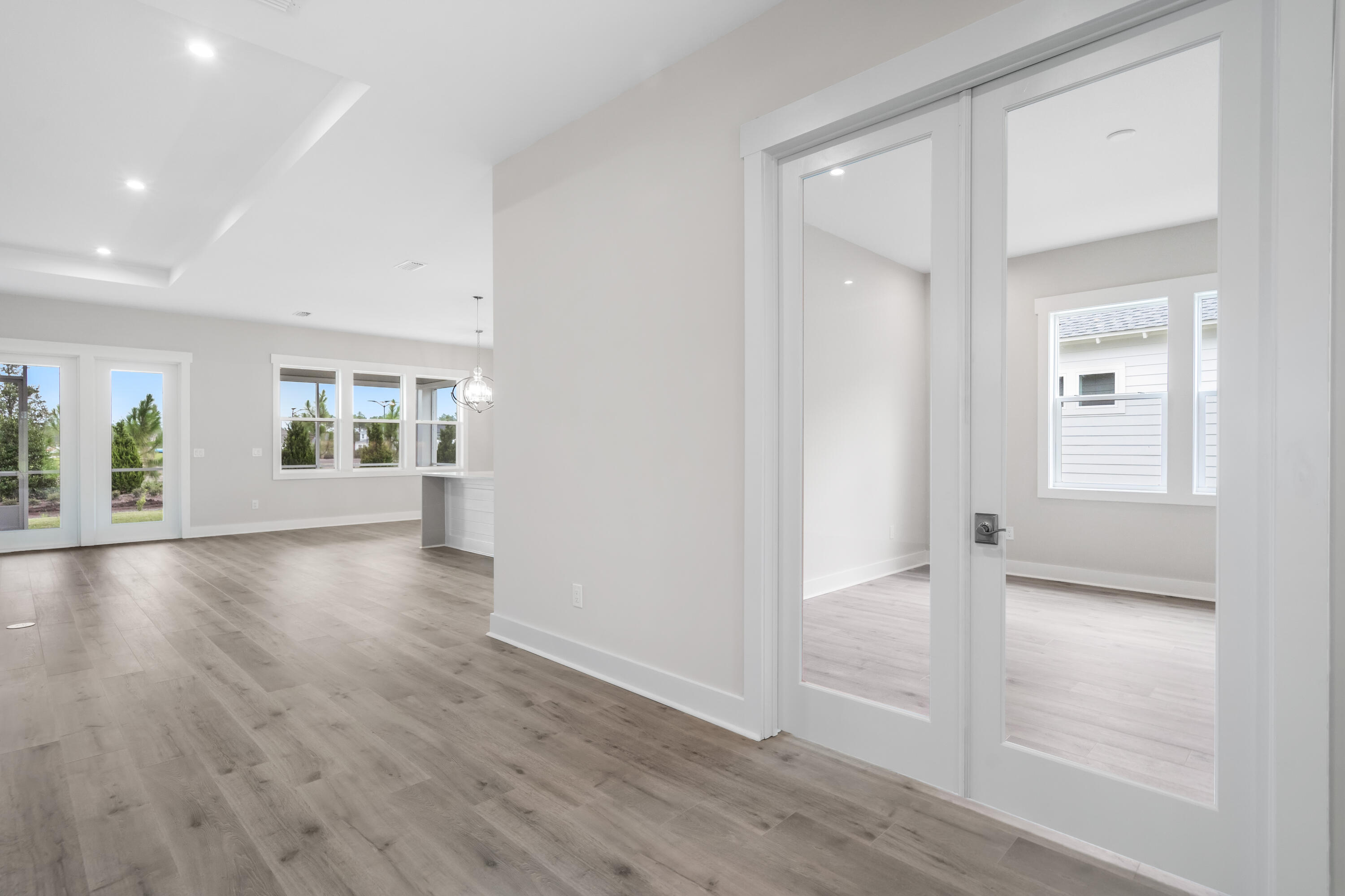 30 River Rise Way Inlet Beach Inlet Beach, FL 32461 - Photo 22 of 61 wooden floor in an empty room with a window
