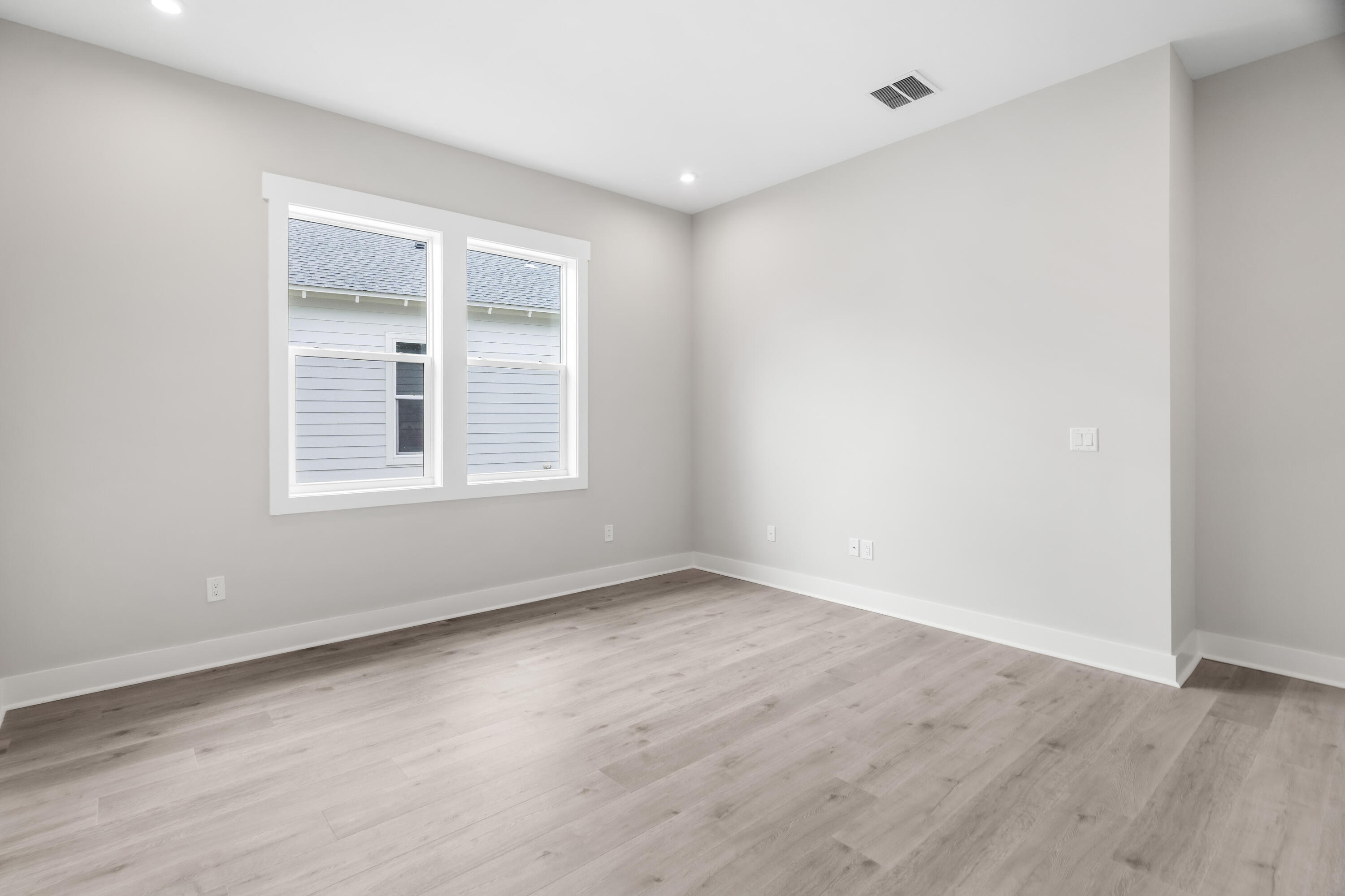 30 River Rise Way Inlet Beach Inlet Beach, FL 32461 - Photo 26 of 61 an empty room with wooden floor and windows