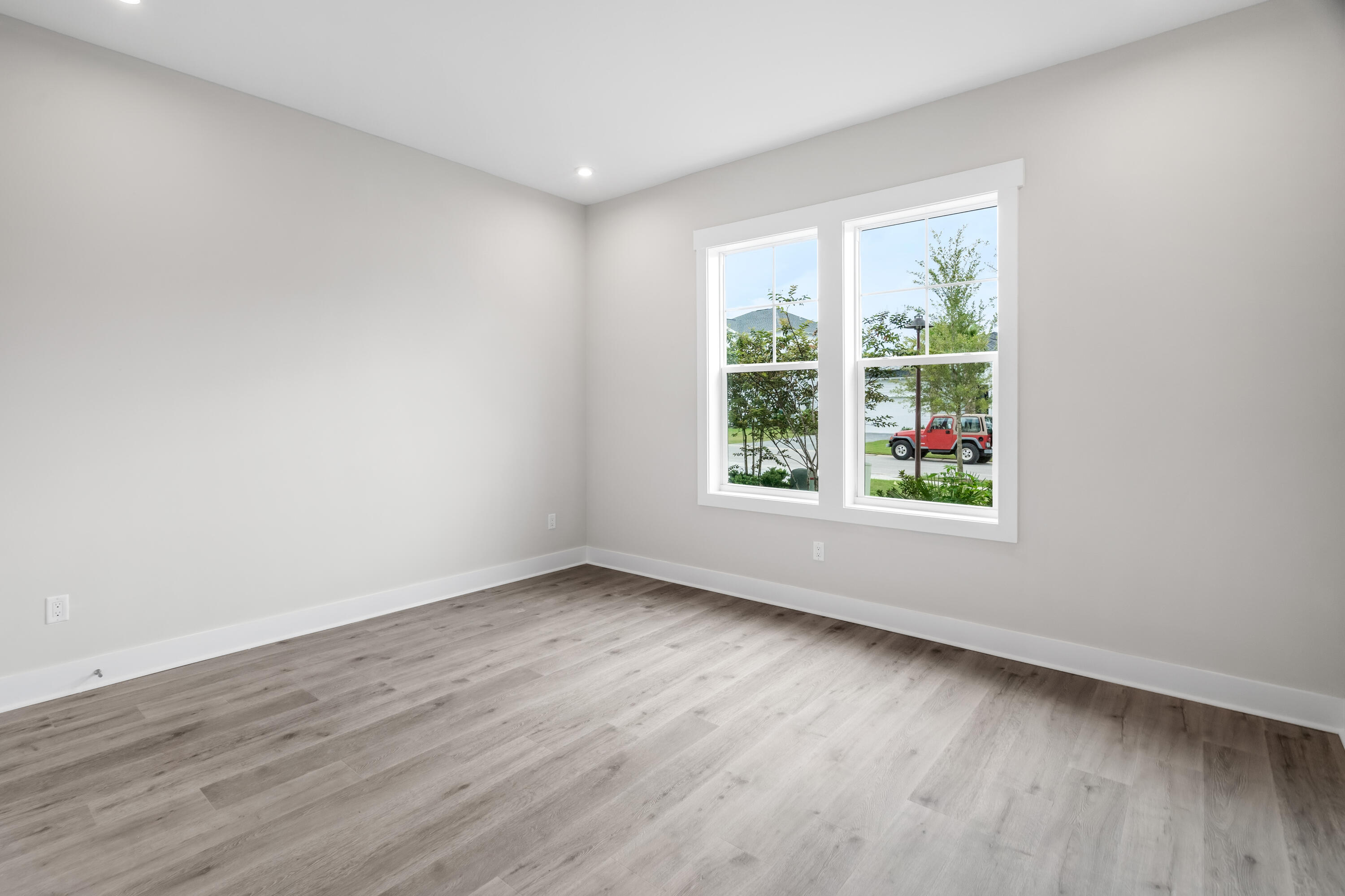 30 River Rise Way Inlet Beach Inlet Beach, FL 32461 - Photo 27 of 61 an empty room with wooden floor and windows