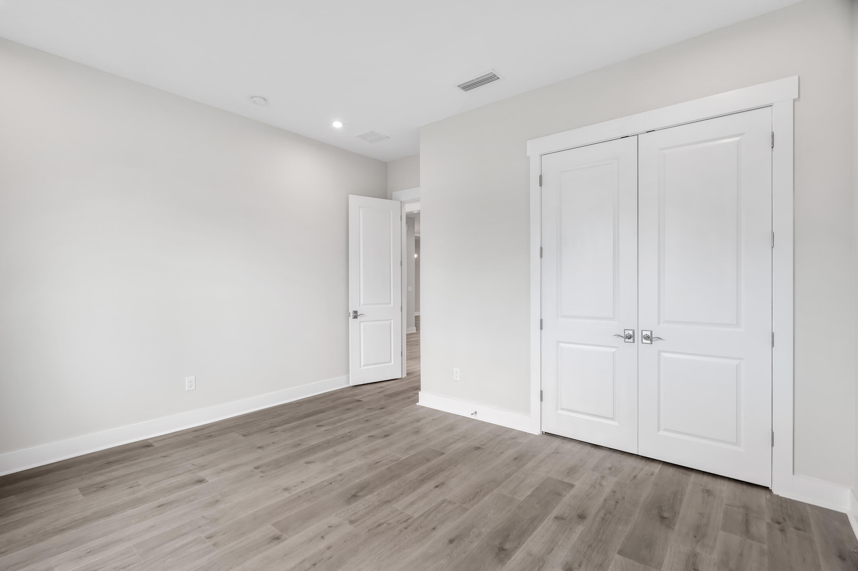 30 River Rise Way Inlet Beach Inlet Beach, FL 32461 - Photo 28 of 61 a view of an empty room with wooden floor