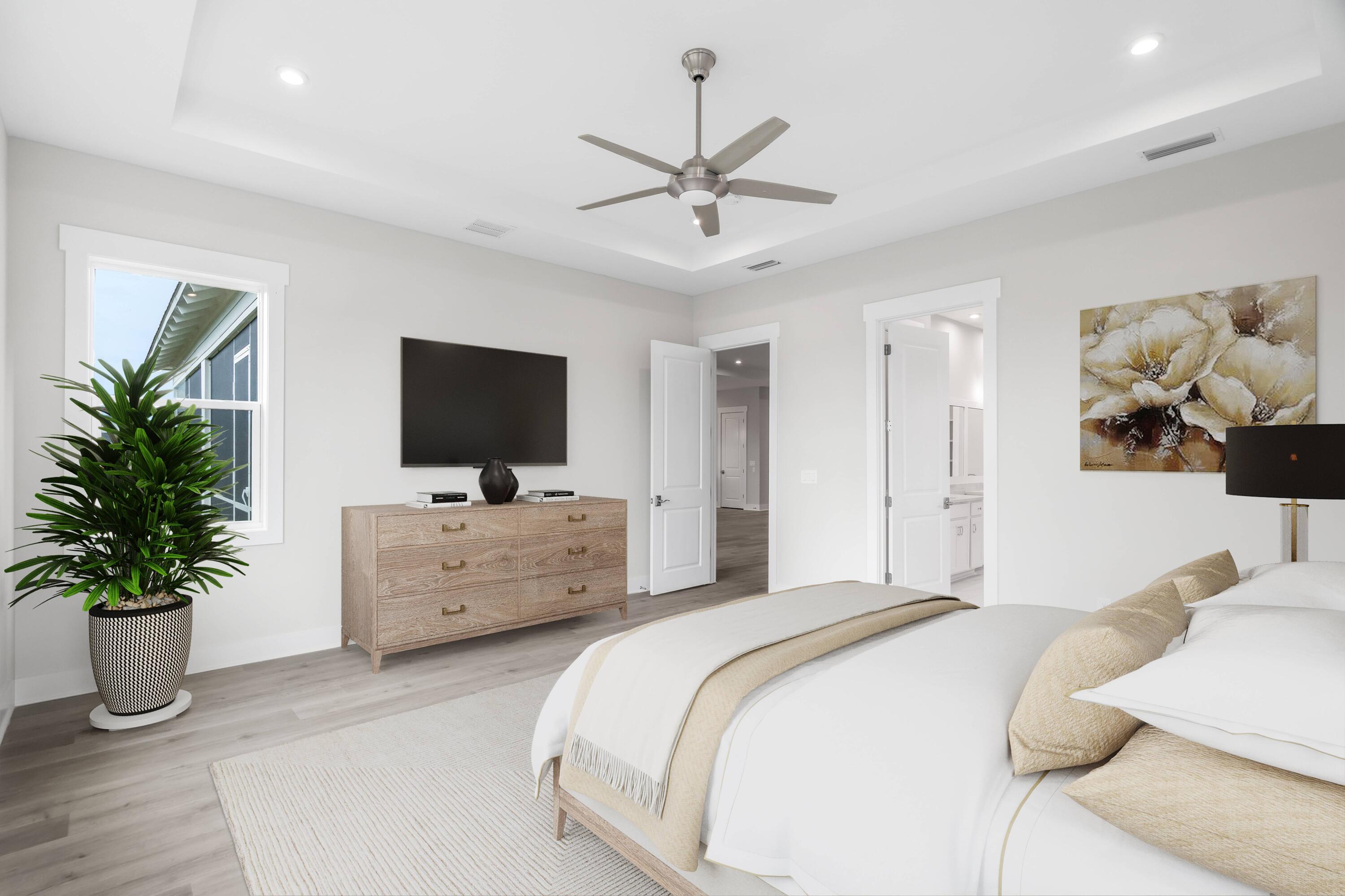 30 River Rise Way Inlet Beach Inlet Beach, FL 32461 - Photo 35 of 61 a bedroom with a bed and a flat screen tv