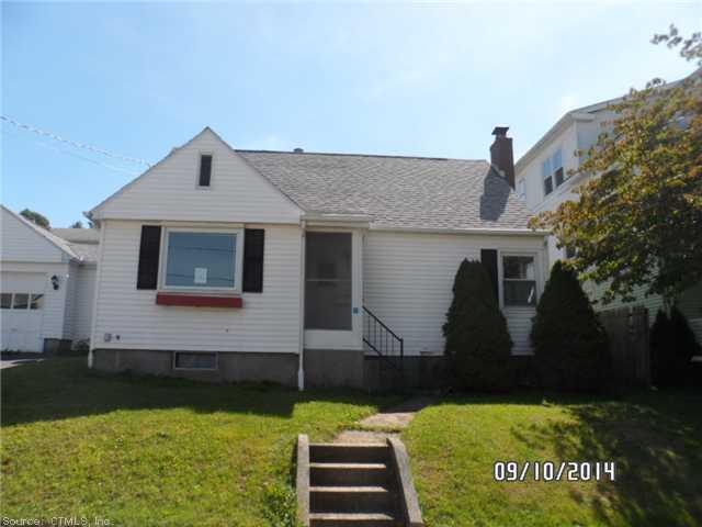 9 Murray Road Bristol, CT 06010 - Photo 1 of 1 a front view of a house with a yard