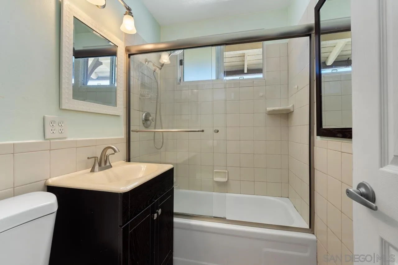 13139 Carriage Road Poway, CA 92064 - Photo 26 of 43 a bathroom with a sink toilet and shower