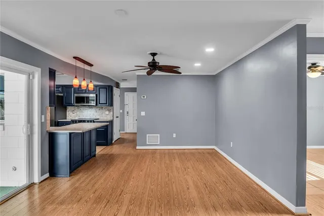 a bathroom with a sink vanity granite and a mirror
