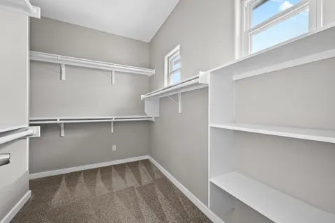 a view of an empty walk in closet