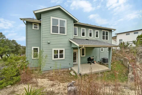 a view of a chairs in the patio