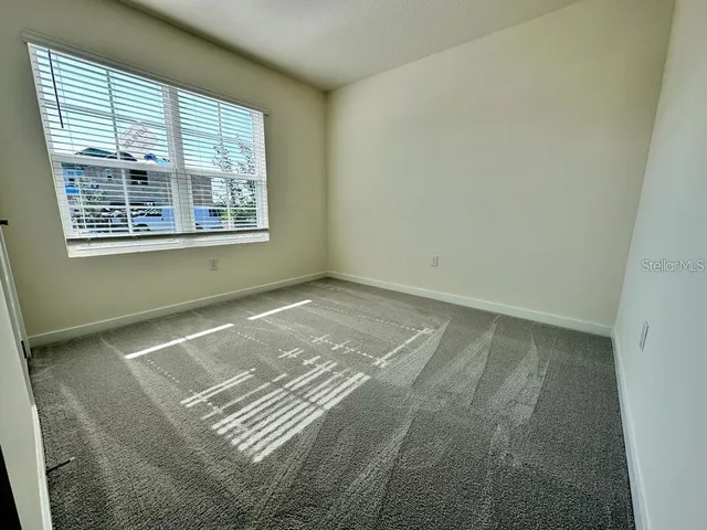 a view of a room with a window