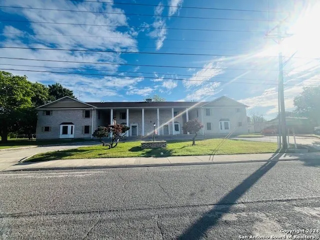 a house view with a backyard space