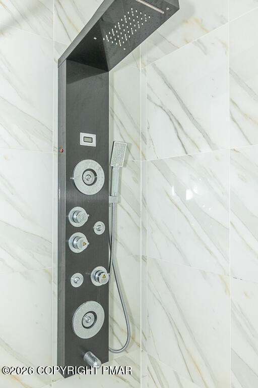 755 White Oak Road Cresco, PA 18326 - Photo 24 of 50 a bathroom with a shower and a mirror