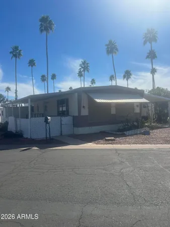 a view of a house with a street