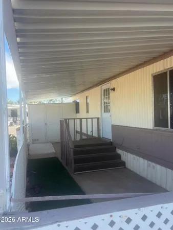 a view of a house with a porch
