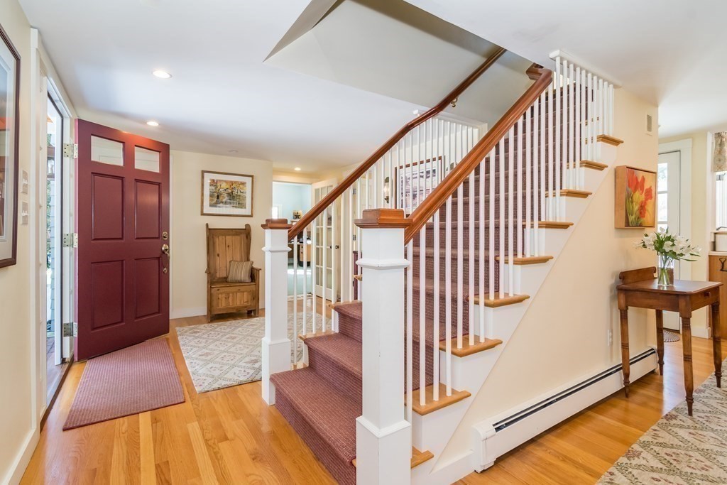 30 Mayo Road Wellesley, MA 02482 - Photo 5 of 33 a view of a hallway with entryway and wooden floor