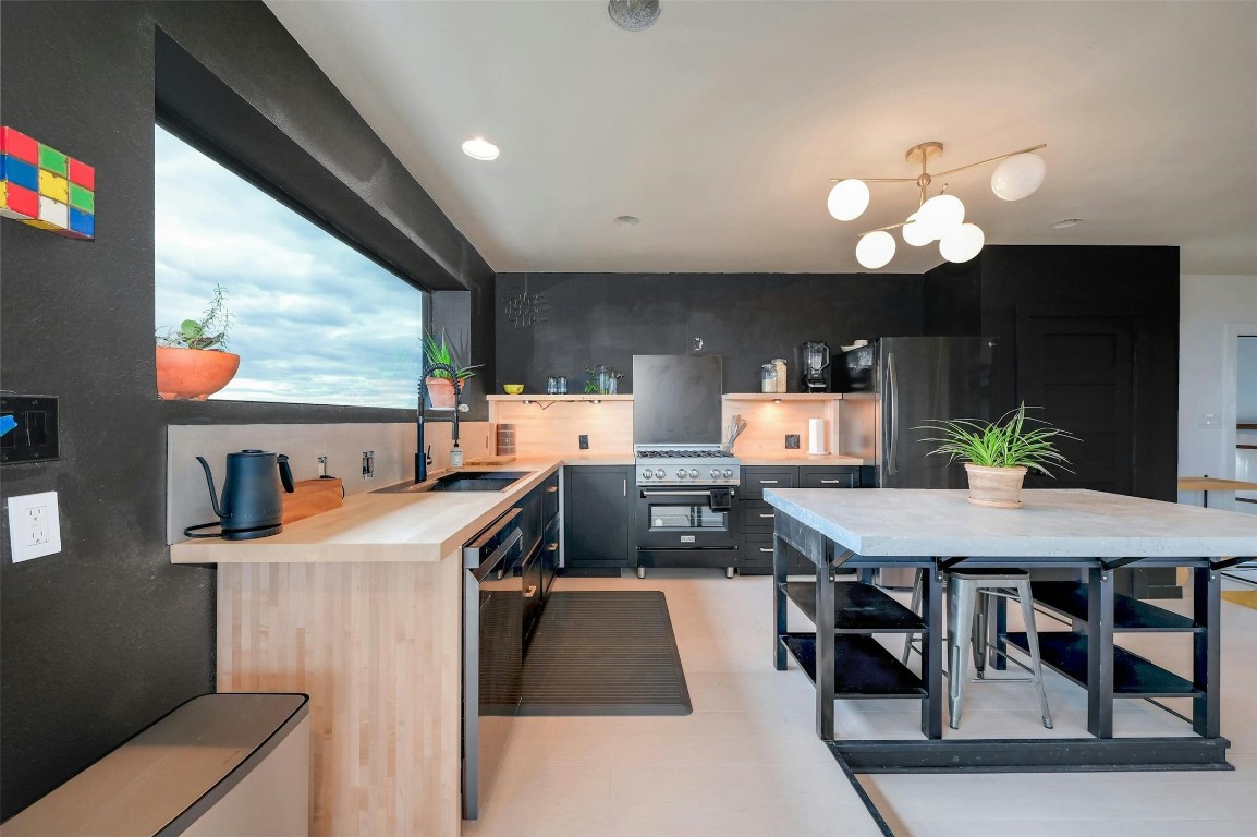 640 Ghost Dancer Fischer, TX 78623 - Photo 15 of 40 a view of a dining room with furniture and a large window